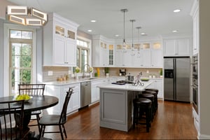 kitchen renovation with island and lighted display cabinets