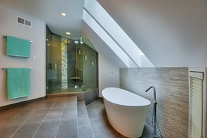 Bathroom remodel with soaking tub and skylights by Denny and Gardner