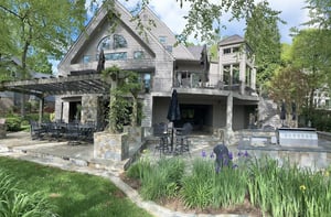 Exterior view of sunroom before addition remodel by Denny + Gardner